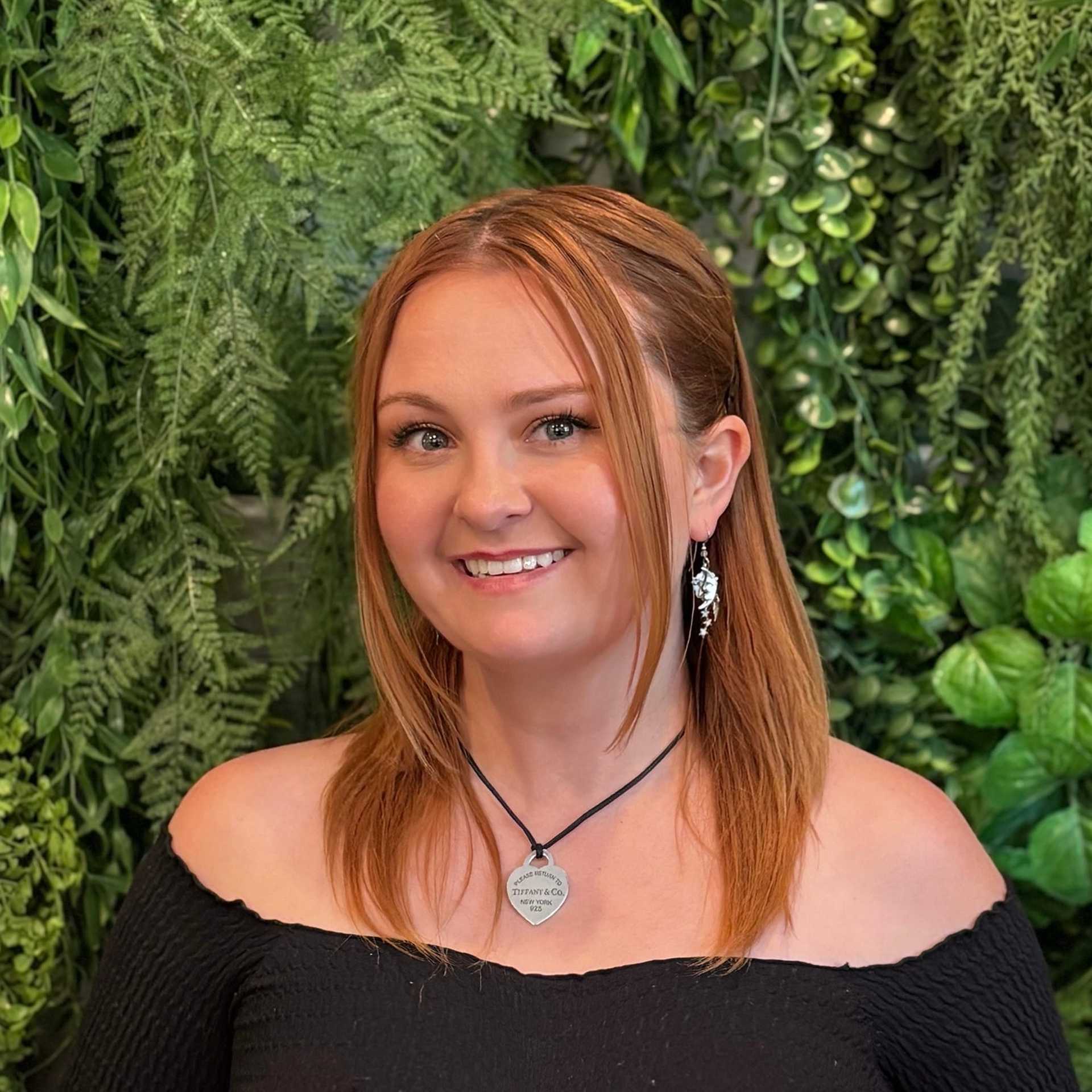 Portrait of Chynna Cline, a professional stylist at Salon Savoir, showcasing their expertise and style.
