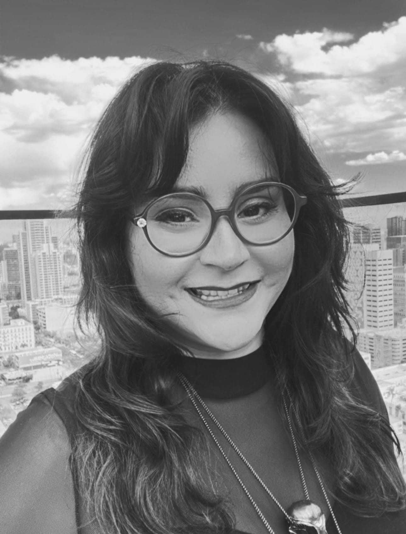 Portrait of Daisy Amparan, a professional stylist at Salon Savoir, showcasing their expertise and style.